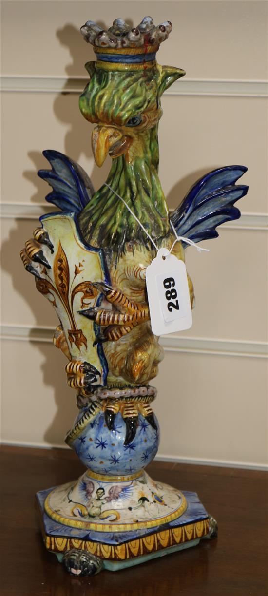 A Cantagalli maiolica griffin candlestick